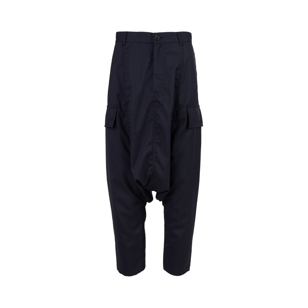 Comme des Garçons Shirt dark navy striped drop-crotch cargo pants with flap side pockets and cropped legs, shown from the front