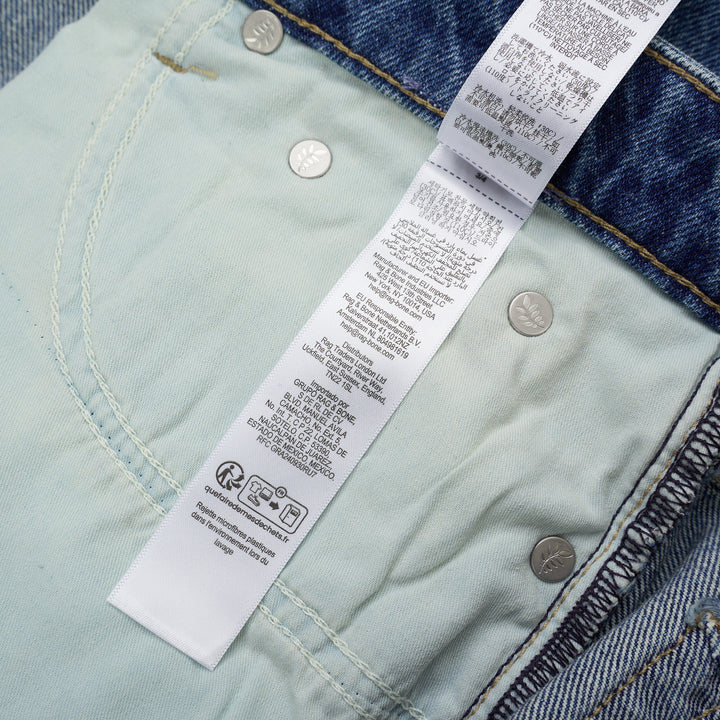 rag & bone Logan Wide Jeans in a faded mid-blue wash, shown from the front with a high-rise waist and wide straight leg - view 4
