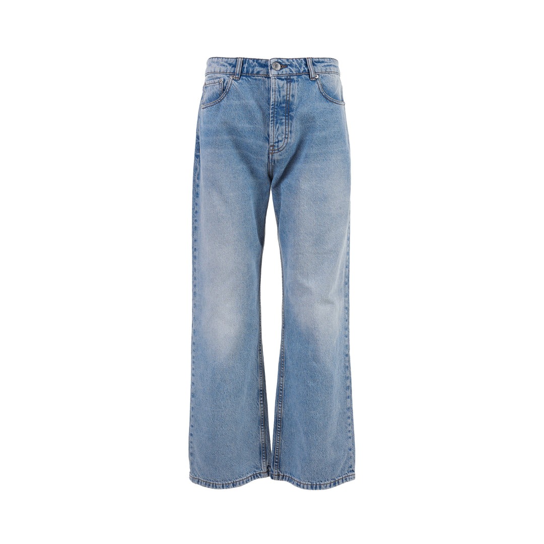 AMI large fit jeans in light washed blue denim with a wide straight leg, five-pocket design and button fly, shown front view