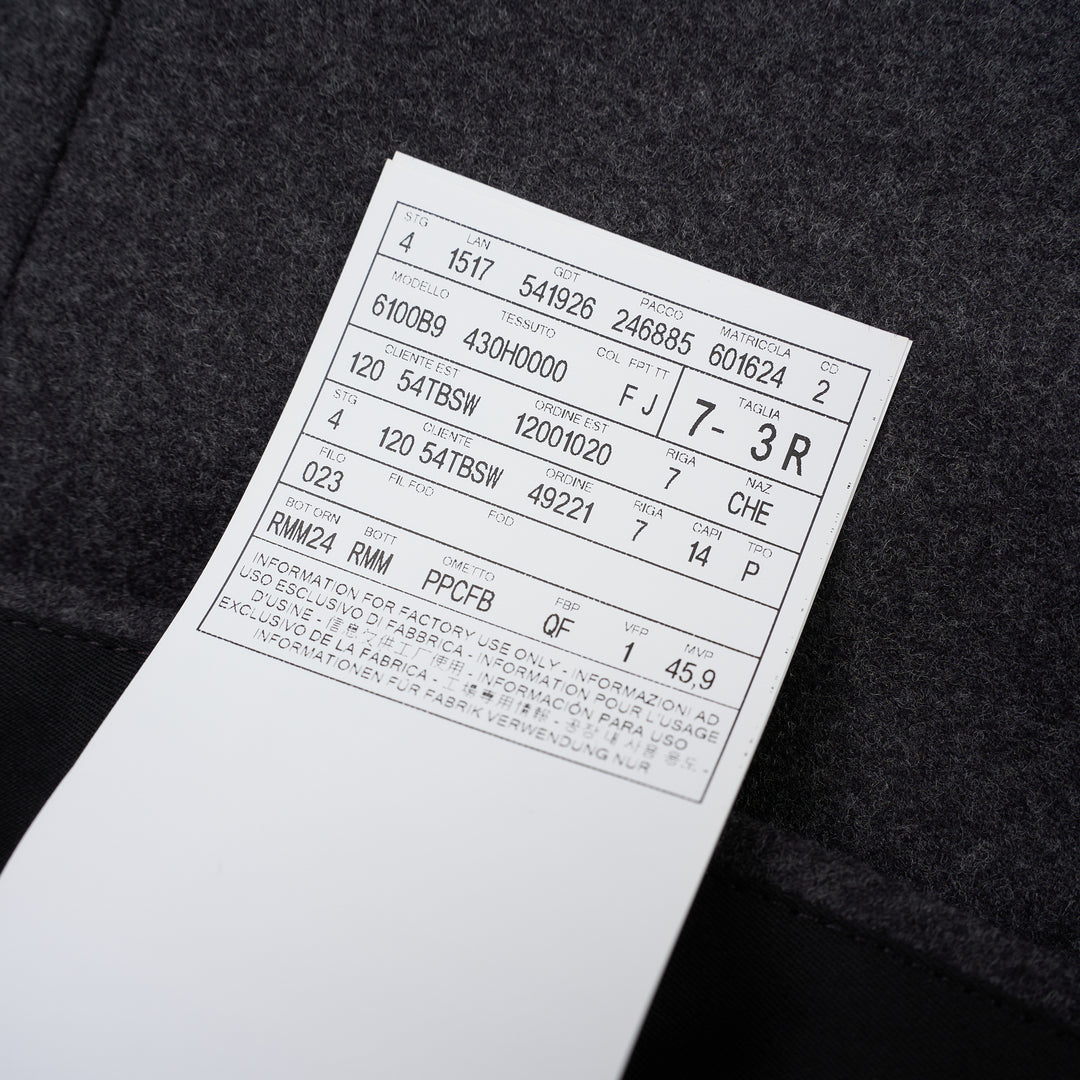 Thom Browne Fit 1 backstrap trousers in charcoal grey with flat front and slim straight leg, shown front view - view 5