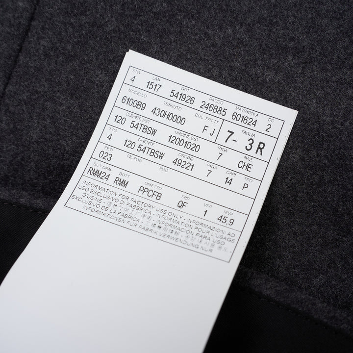 Thom Browne Fit 1 backstrap trousers in charcoal grey with flat front and slim straight leg, shown front view - view 5