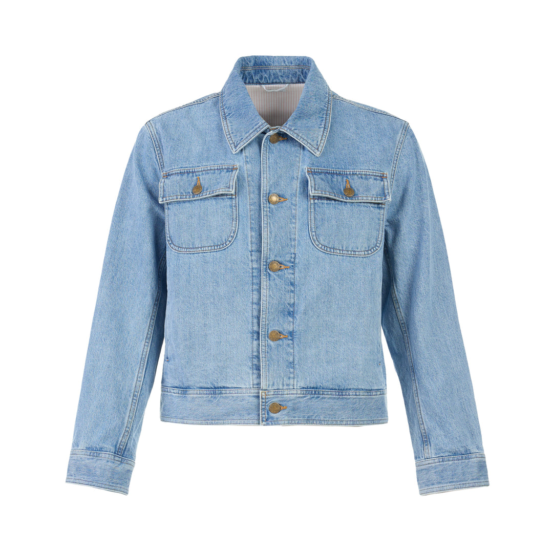 Thom Browne Backstrap Utility Jacket in light-wash denim with twin chest flap pockets and brass buttons, shown from the front