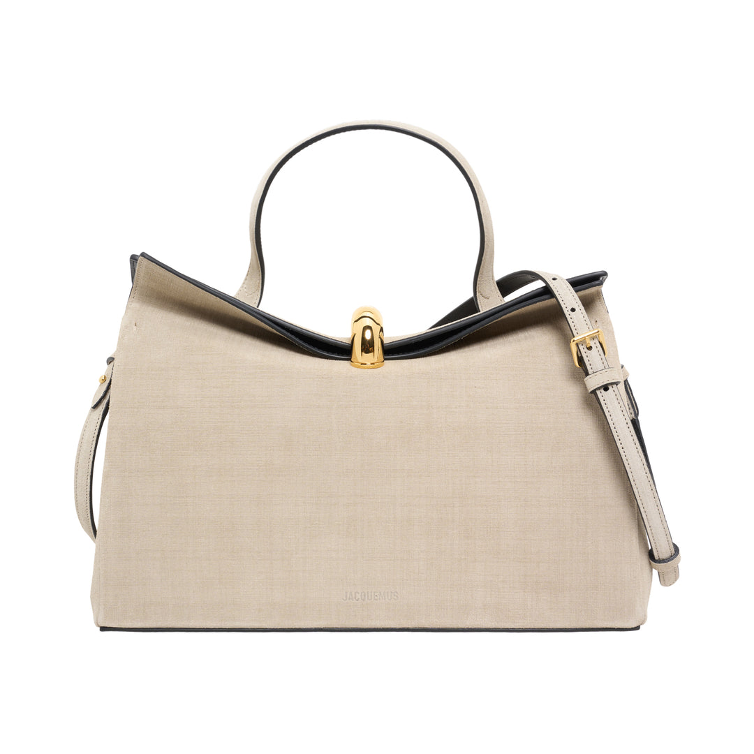 Jacquemus Le Valérie beige top handle handbag with sculptural gold clasp and adjustable shoulder strap