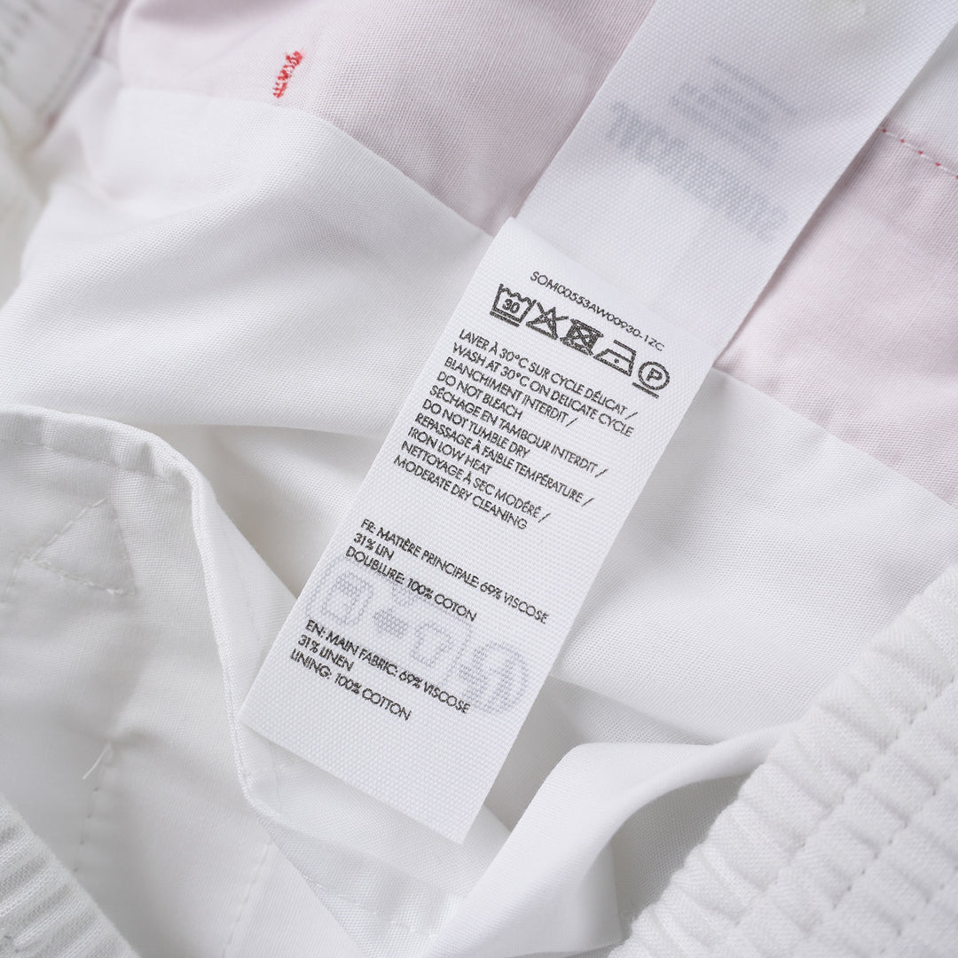 Jacquemus white pyjama shorts with sketched chain print down the legs, elasticated waistband and contrast red side stripe - view 3