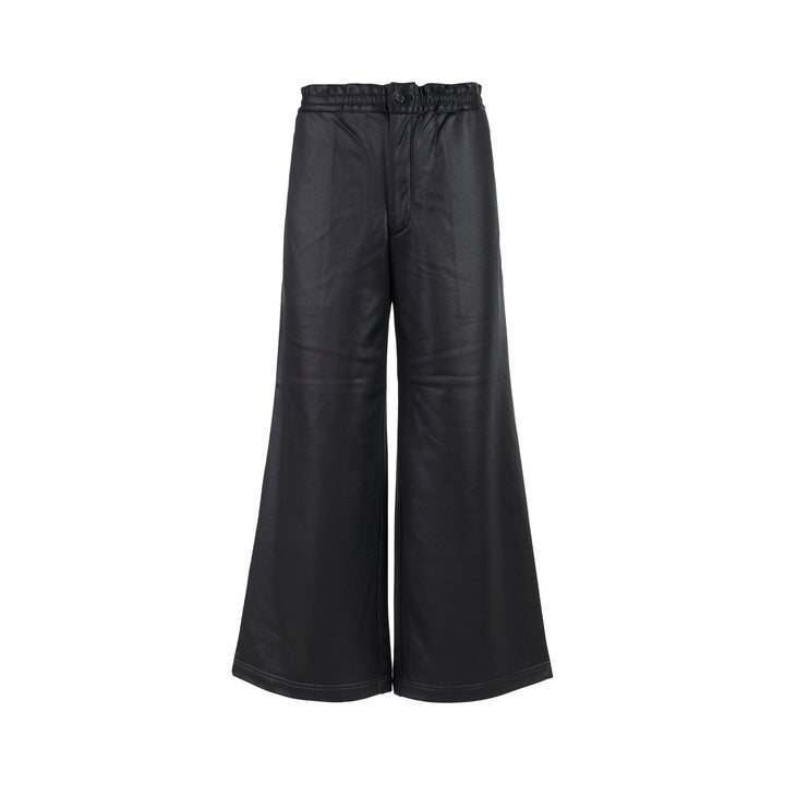 Comme des Garçons Homme Plus black gloss finish wide-leg flared pants with elasticated waistband, shown from the front