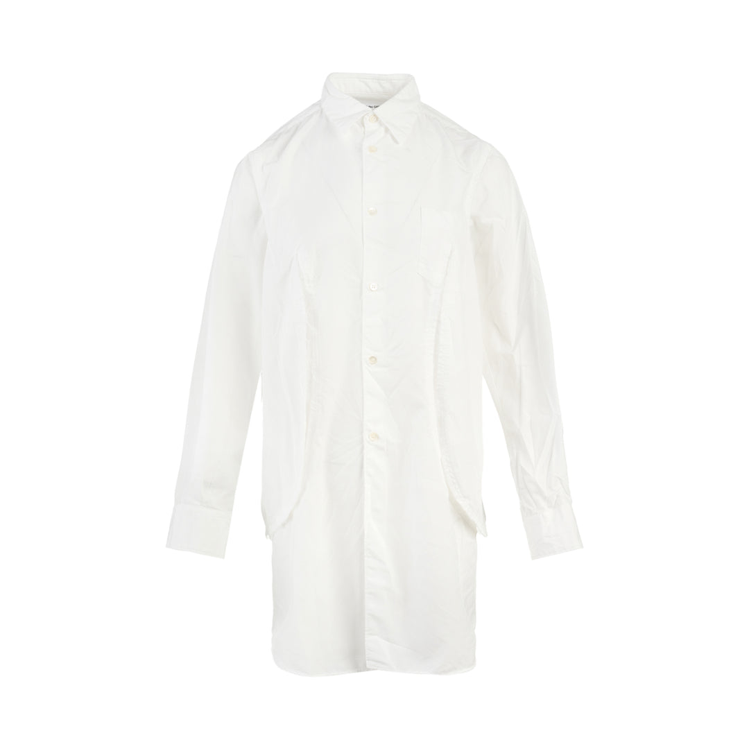 Comme des Garçons Comme des Garçons white longline shirt with raw-edge panel seams, chest pocket and button-through front