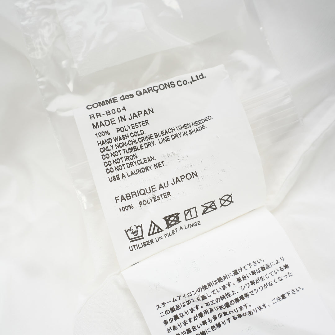 Comme des Garçons Comme des Garçons white longline shirt with raw-edge panel seams, chest pocket and button-through front - view 3