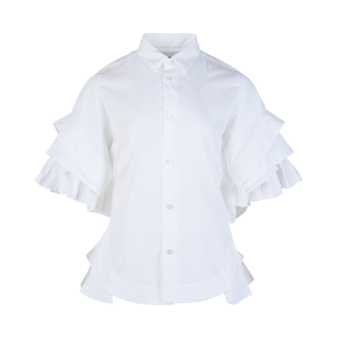 Noir Kei Ninomiya white cotton typewriter shirt with tiered pleated ruffle sleeves, pointed collar, button placket and curved flared hem