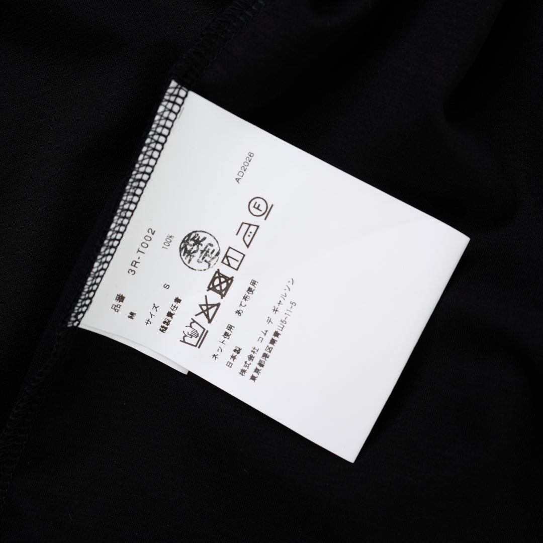 Noir Kei Ninomiya black cotton ponte tee with crew neck and twisted knot detailing on both short sleeves, shown from the front - view 4