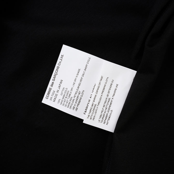 Noir Kei Ninomiya black cotton ponte tee with crew neck and twisted knot detailing on both short sleeves, shown from the front - view 6