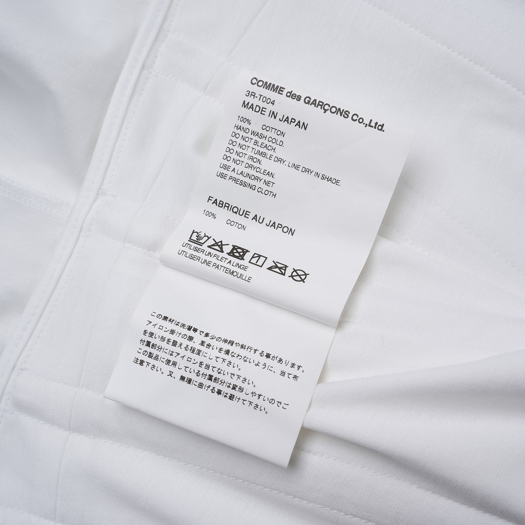 Noir Kei Ninomiya white cotton ponte top with corset-style seaming, puff sleeves, peplum hem and front zip closure - view 3