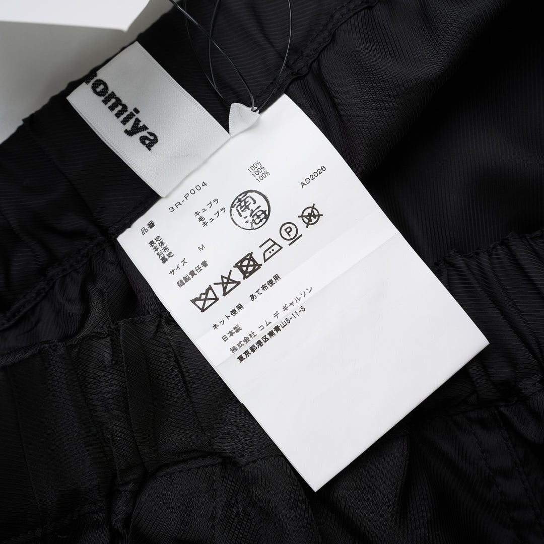 Noir Kei Ninomiya black wide-leg pants in cupra twill and wool gabardine with elasticated waist and layered tailored lower section - view 4