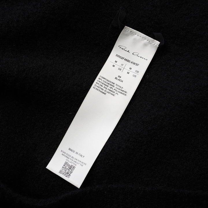 Rick Owens black sleeveless hooded tank in textured knit, shown from the front on a white background - view 3