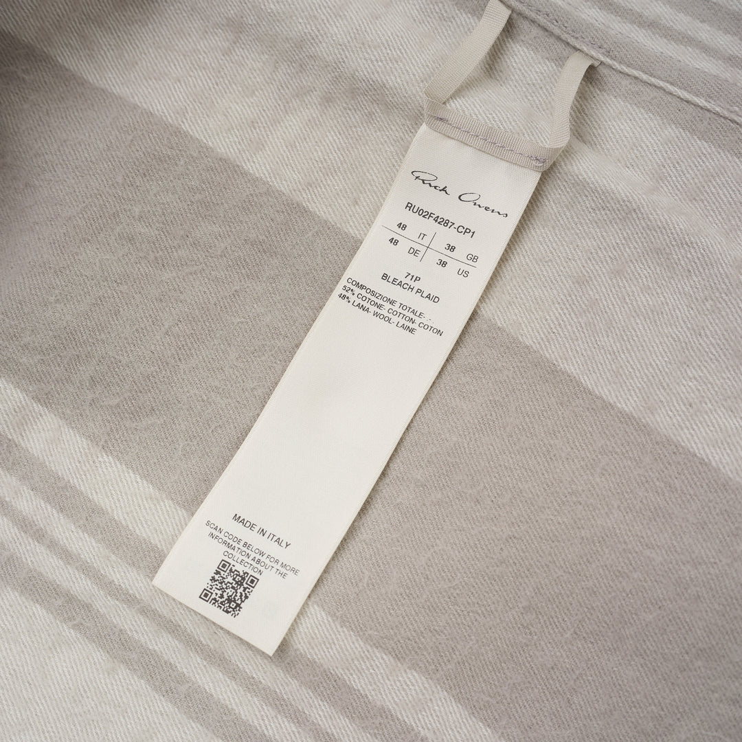 Back view of the Rick Owens Larry Fogpocket long sleeve shirt in a warm beige and cream brushed plaid with snap-fastened stand collar and snap cuffs - view 4
