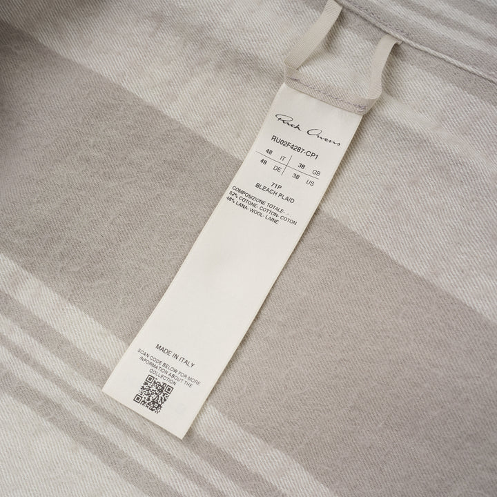 Back view of the Rick Owens Larry Fogpocket long sleeve shirt in a warm beige and cream brushed plaid with snap-fastened stand collar and snap cuffs - view 4