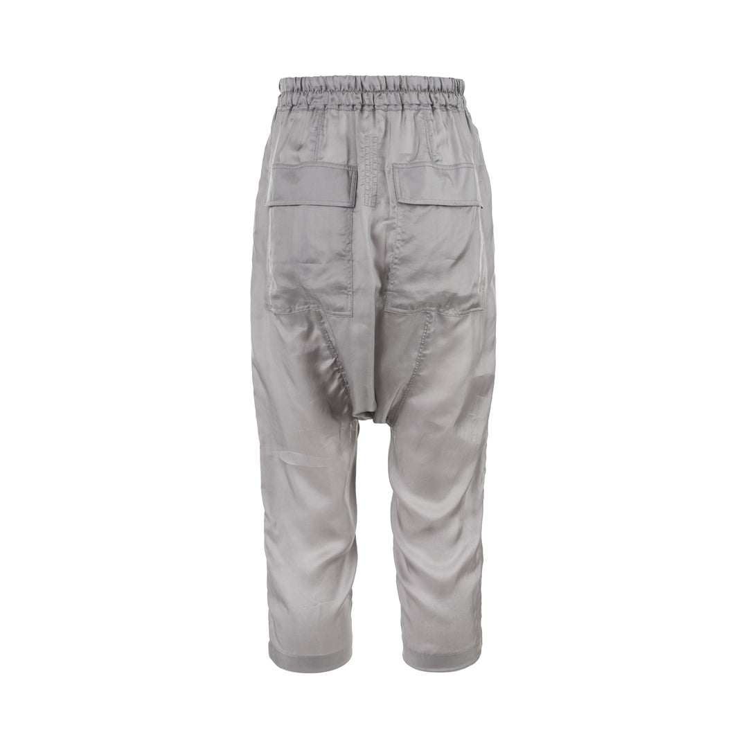 Rick Owens grey drawstring cropped pants with a dropped crotch, elasticated waistband and fluid, semi-sheer fabric, shown from the front - view 2