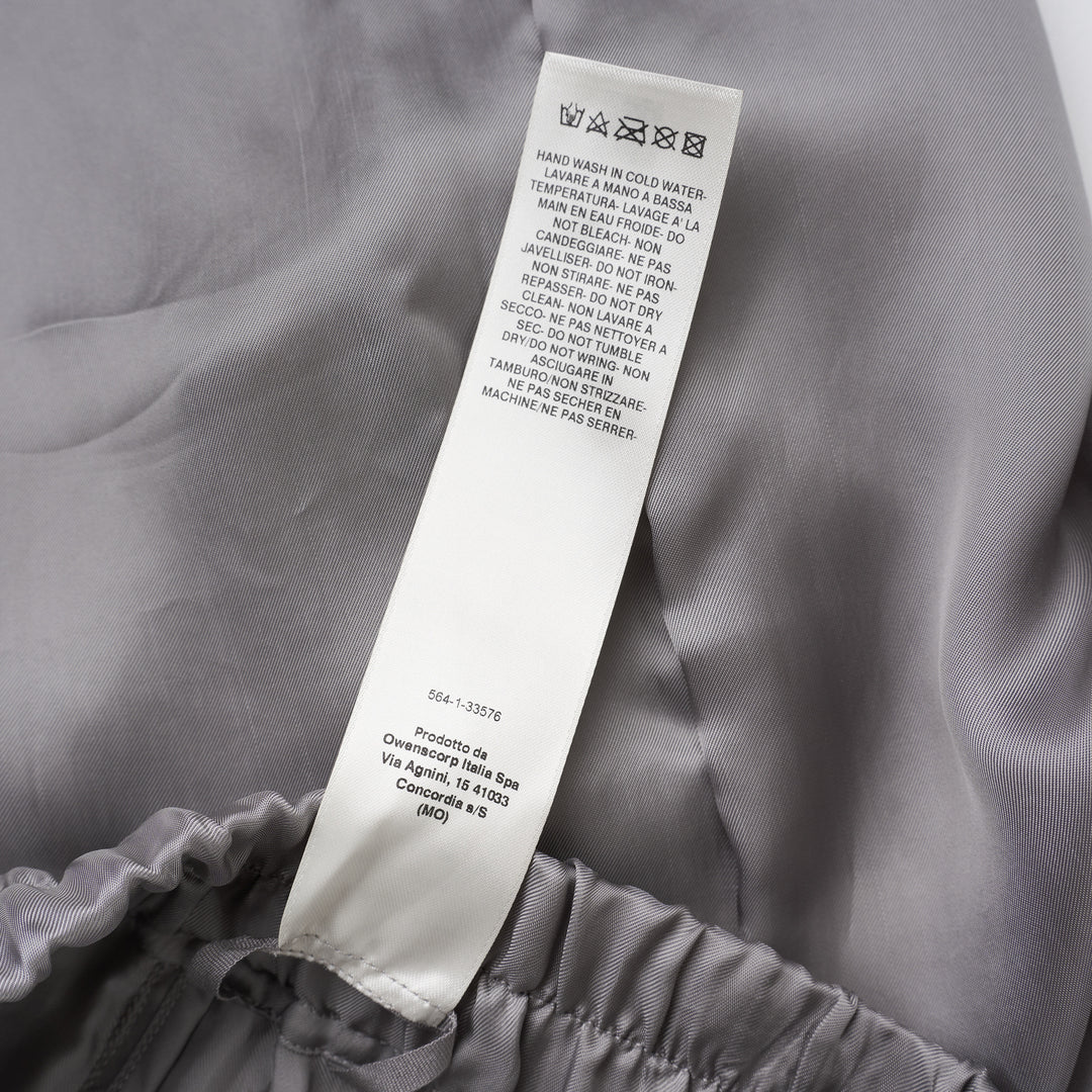 Rick Owens grey drawstring cropped pants with a dropped crotch, elasticated waistband and fluid, semi-sheer fabric, shown from the front - view 4