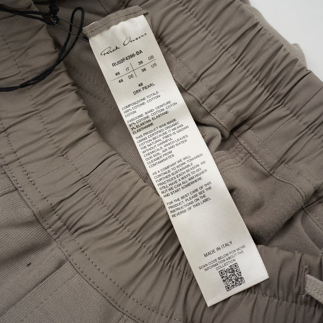 Back view of Rick Owens Mastodon cargo pants in taupe with flap back pockets, side cargo pockets and ribbed cuffs - view 3