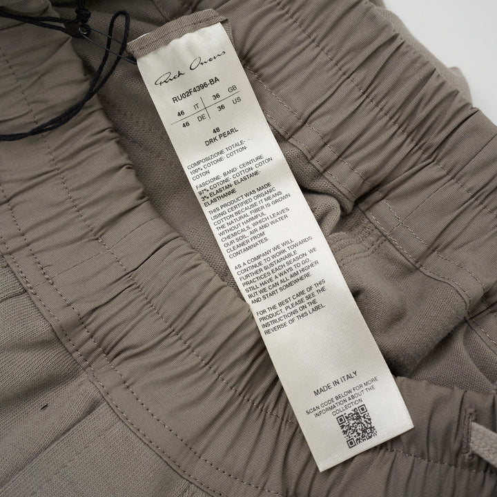 Back view of Rick Owens Mastodon cargo pants in taupe with flap back pockets, side cargo pockets and ribbed cuffs - view 3