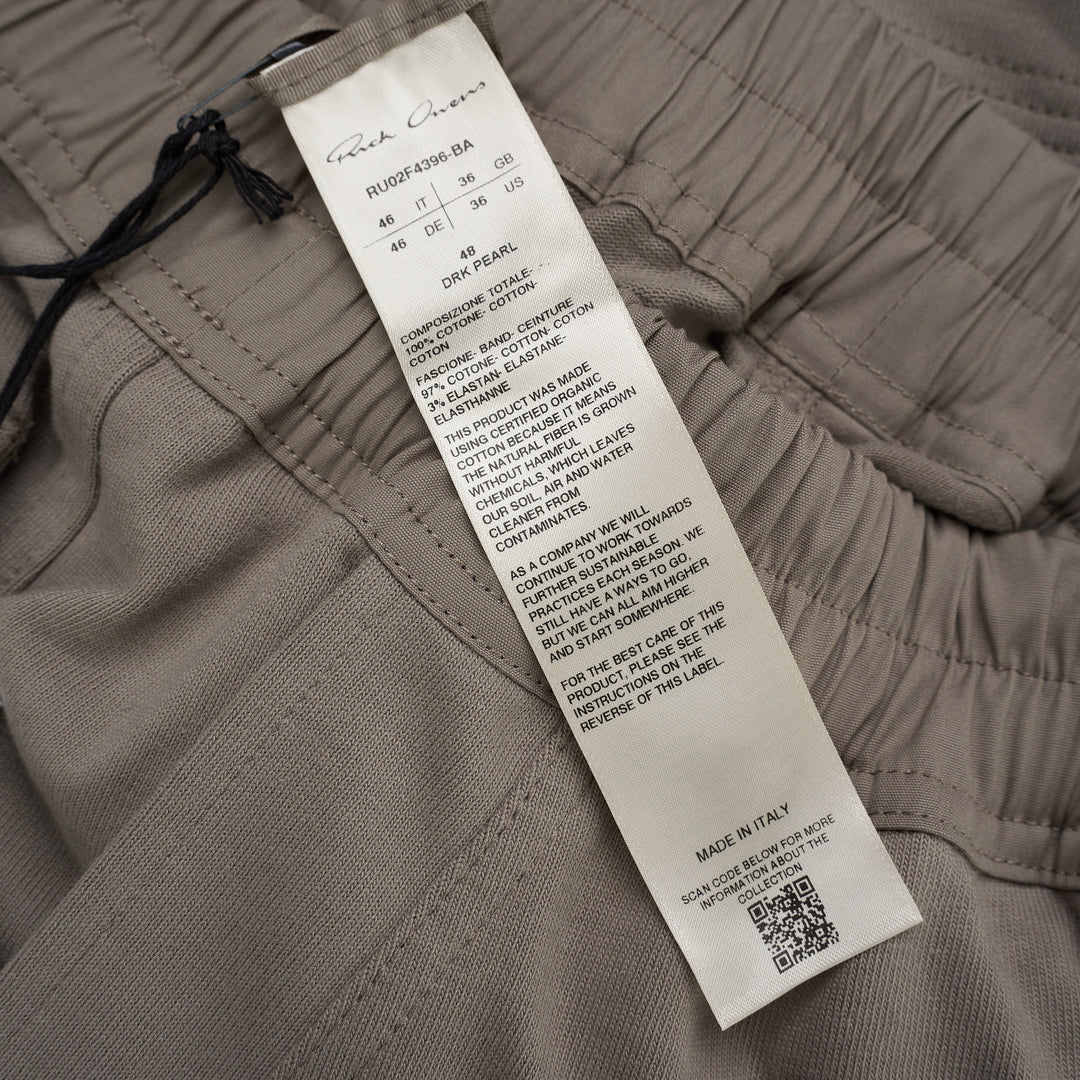 Back view of Rick Owens Mastodon cargo pants in taupe with flap back pockets, side cargo pockets and ribbed cuffs - view 4