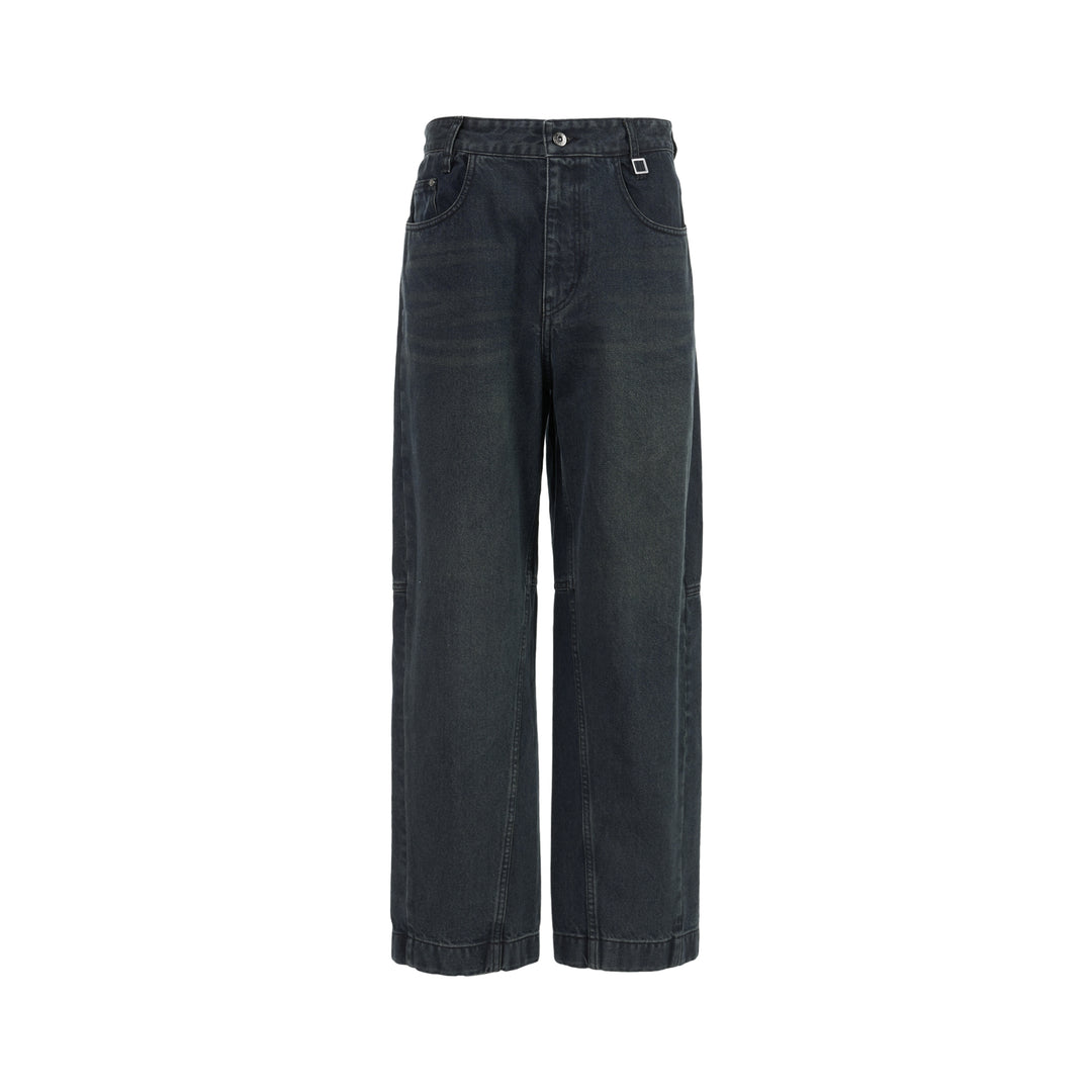 Wooyoungmi wide leg jeans in washed dark indigo denim with paneled knees and square metal waistband hardware, shown flat from the front