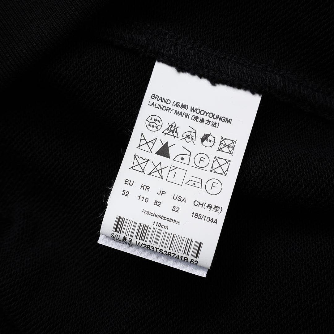 Wooyoungmi black pullover hoodie with drawstring hood, kangaroo pocket and tonal logo patch on the chest - view 3