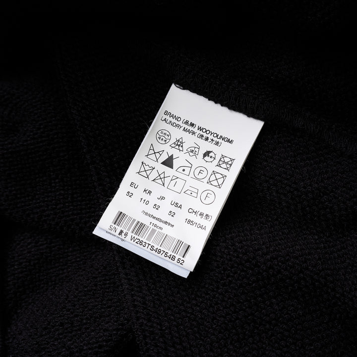 Black Wooyoungmi zip-up hoodie with padlock-style zip pull, stud-detailed kangaroo pockets and small gold logo on the chest - view 3