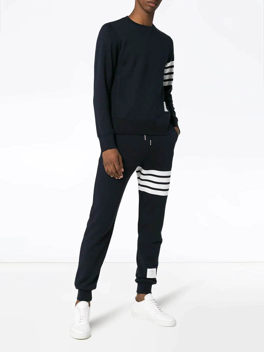 Thom Browne dark grey classic sweatpants with four-bar white stripe on the leg and ribbed cuffs
