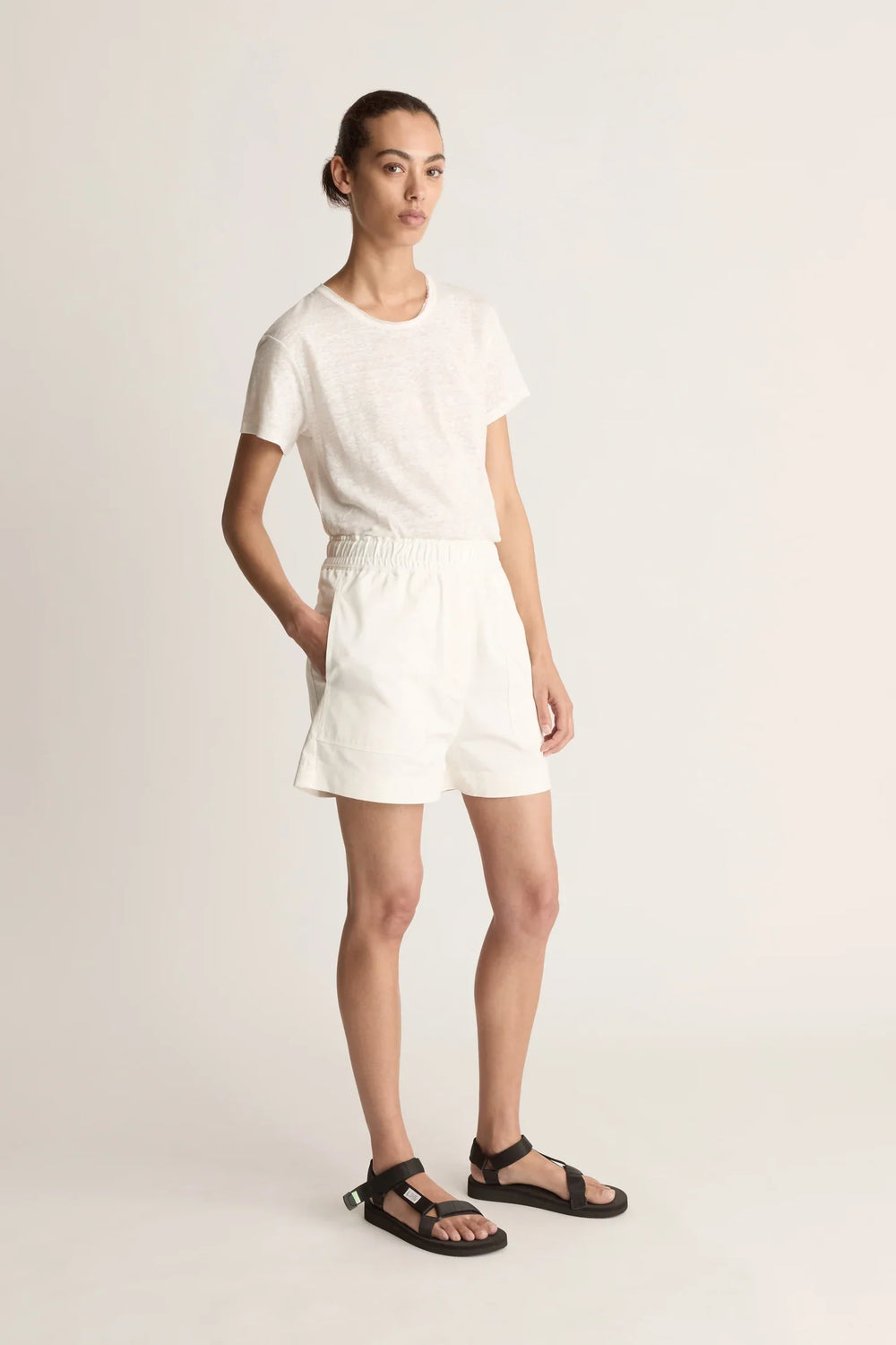 Lee Mathews Drill Short in off-white with elasticated waistband and relaxed wide-leg silhouette, laid flat on white background