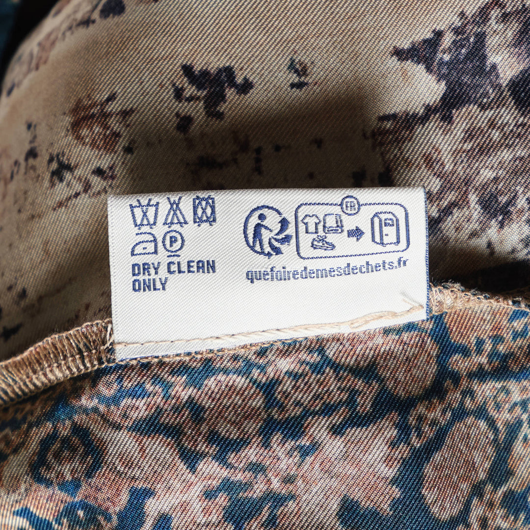 Pierre-Louis Mascia Aloe printed trousers with an artistic East Asian-inspired landscape print featuring birds, florals, and botanical motifs on warm sand and terracotta tones, with a teal elasticated drawstring waistband - view 4