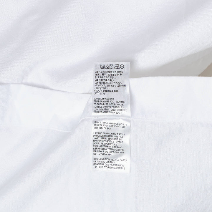Thom Browne Supersized Point Collar Shirt in white Oxford cotton with RWB grosgrain armband stripe and button-down collar, front view