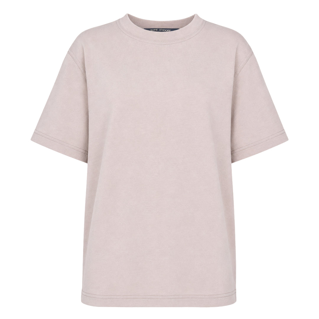 Sofie D'Hoore short sleeve boxy tee in dusty rose with ribbed crew neck and topstitched hem, displayed flat on white background