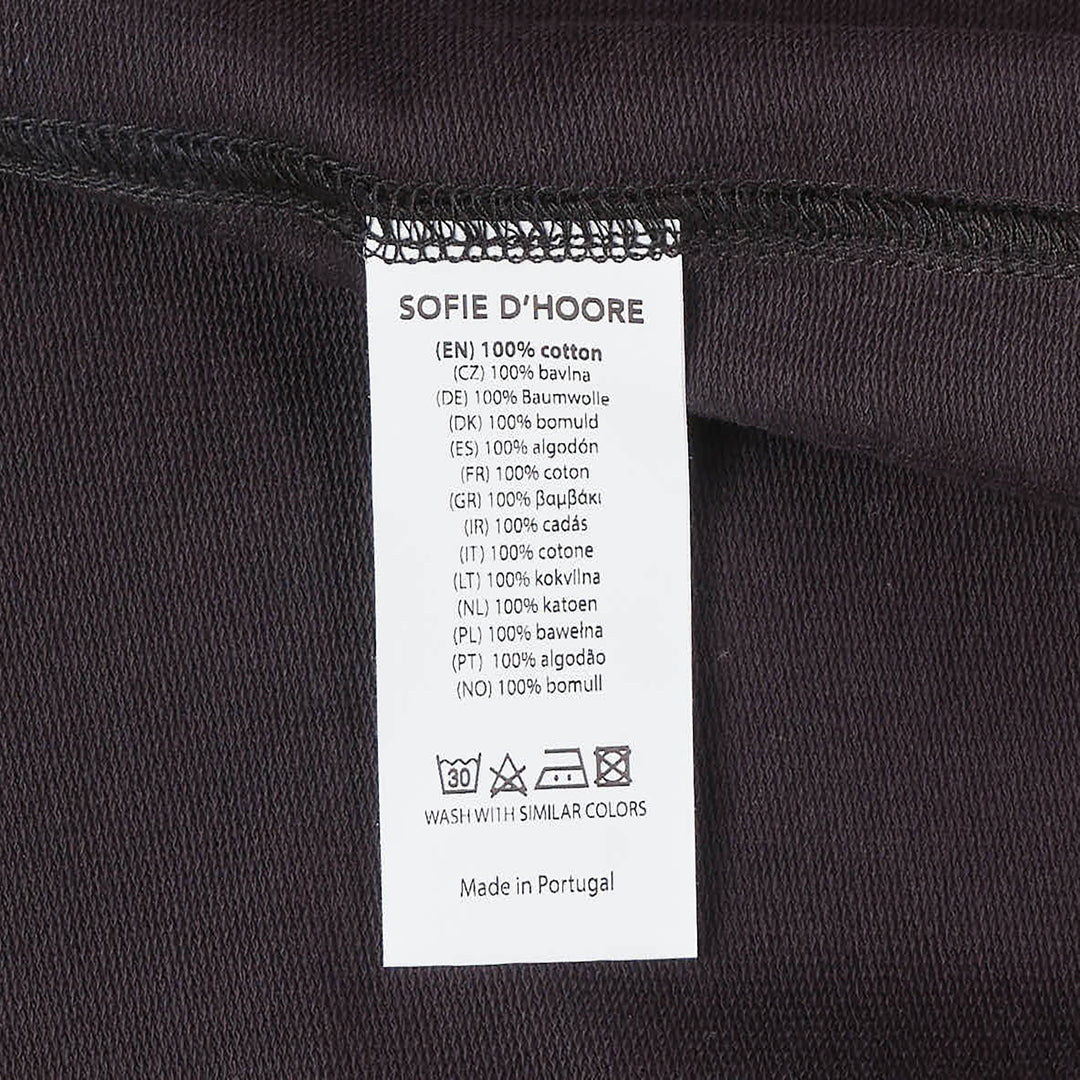 Sofie D'Hoore short sleeve boxy tee in dusty rose with ribbed crew neck and topstitched hem, displayed flat on white background