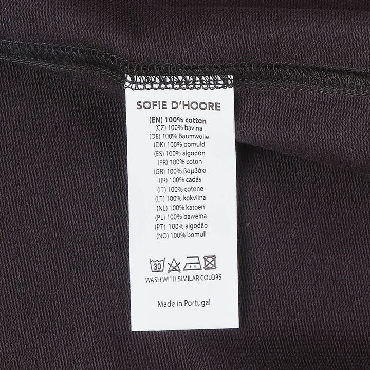 Sofie D'Hoore short sleeve boxy tee in dusty rose with ribbed crew neck and topstitched hem, displayed flat on white background