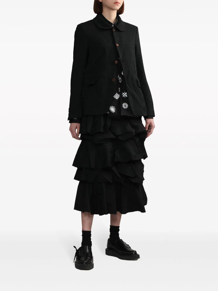 Comme des Garçons BLACK Filip Pagowski Print Blouse in black with allover white snowflake and floral graphic motifs, long sleeves and point collar, flat lay view