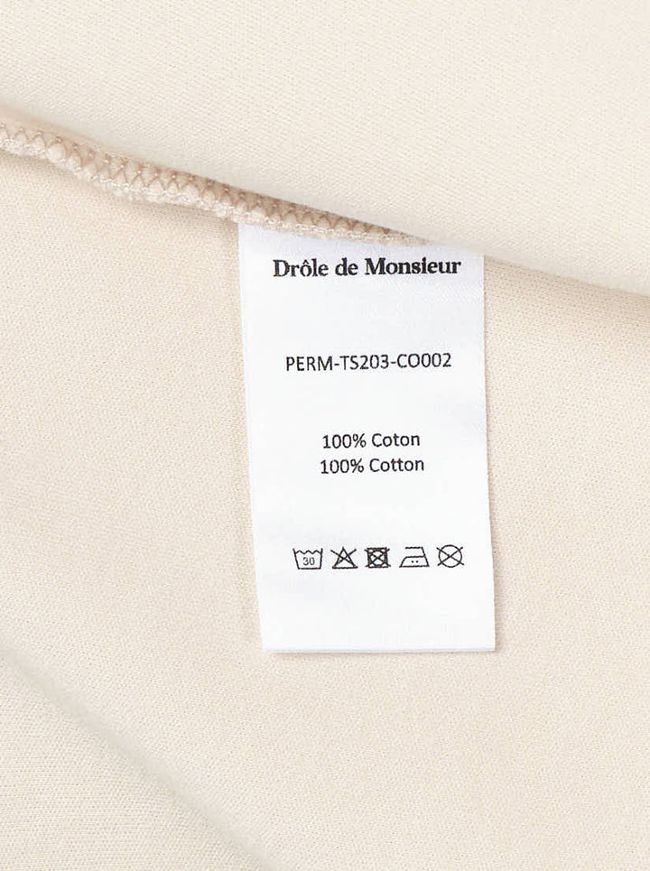 Drôle de Monsieur Not From Paris Madame slogan tee in cream with bold black chest text print, boxy fit, crew neck - view 4