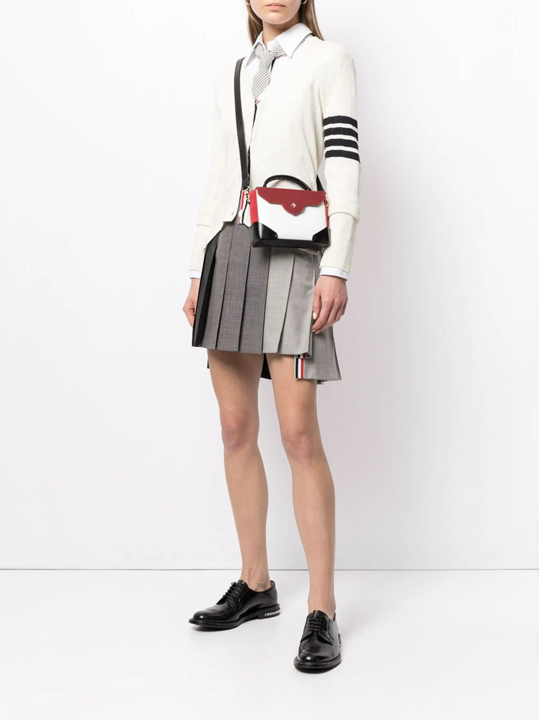 Thigh Length Dropped Back Pleated Skirt