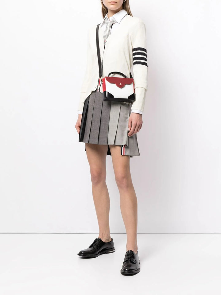 Thigh Length Dropped Back Pleated Skirt