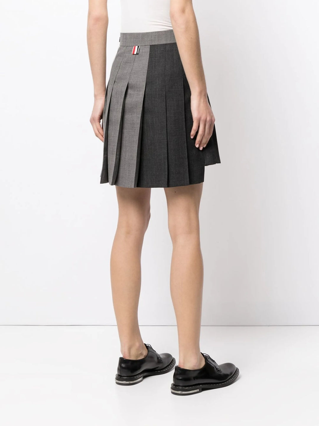 Thigh Length Dropped Back Pleated Skirt