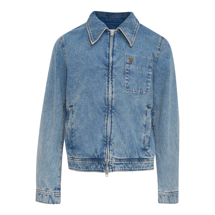 AMI Paris Ami de Cœur Zipped Blouson in washed blue denim with full-length zip closure, pointed collar, chest patch pocket with heart logo, and cropped silhouette