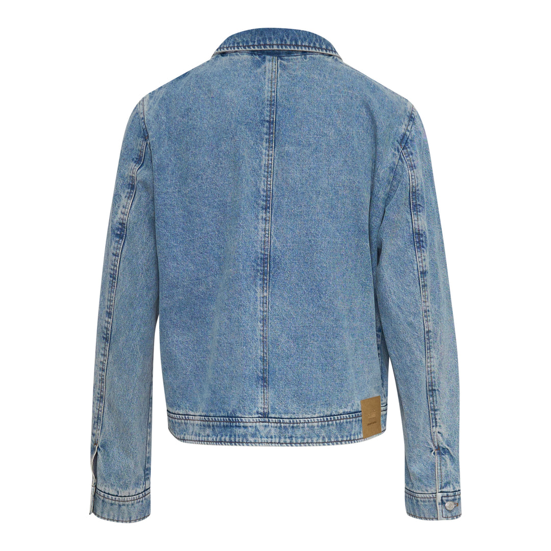AMI Paris Ami de Cœur Zipped Blouson in washed blue denim with full-length zip closure, pointed collar, chest patch pocket with heart logo, and cropped silhouette