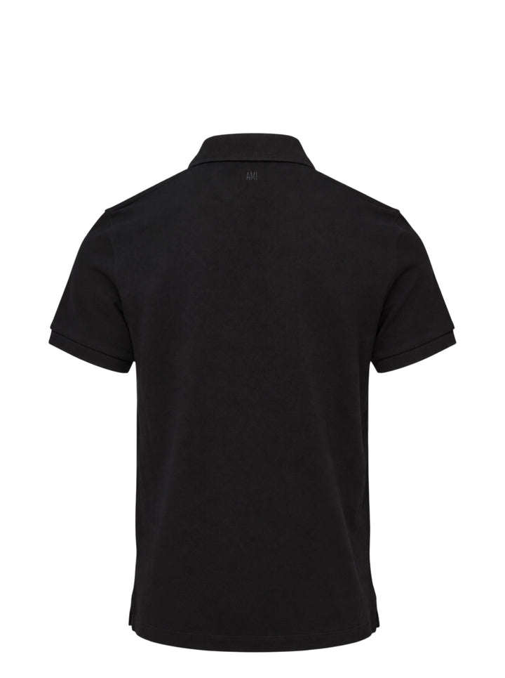 Ami Alexandre Mattiussi black piqué polo shirt with white Ami de Cœur logo embroidery on the chest and a two-button placket, front view - view 2