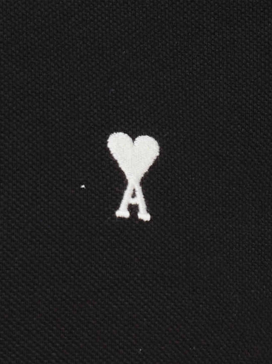 Ami Alexandre Mattiussi black piqué polo shirt with white Ami de Cœur logo embroidery on the chest and a two-button placket, front view - view 3