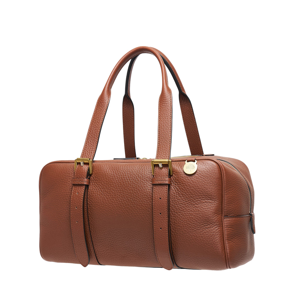 Mulberry Boston Heavy Grain Medium Top Handle bag in chalk pebbled leather with antique brass buckle hardware and dual top handles, front view