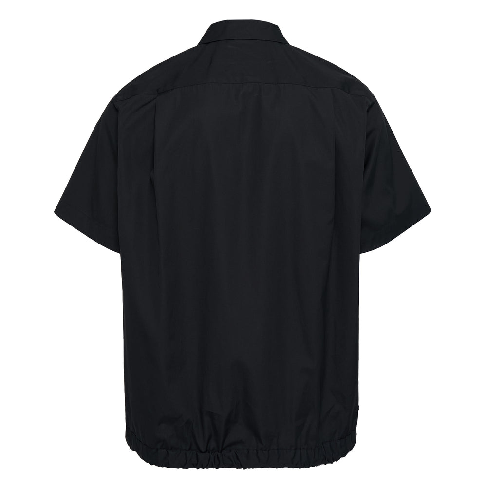 sacai Cotton Poplin Short Sleeve Shirt in black with dual chest pockets and elasticated drawstring hem, front view on white background
