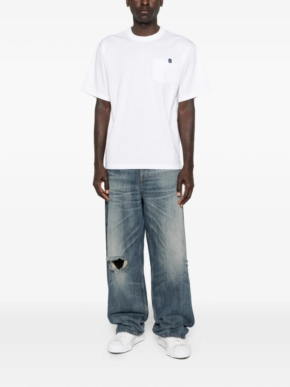sacai Cotton Jersey T-Shirt in dark charcoal with gold embroidered 'S' logo on chest pocket, relaxed boxy fit and ribbed crew neck