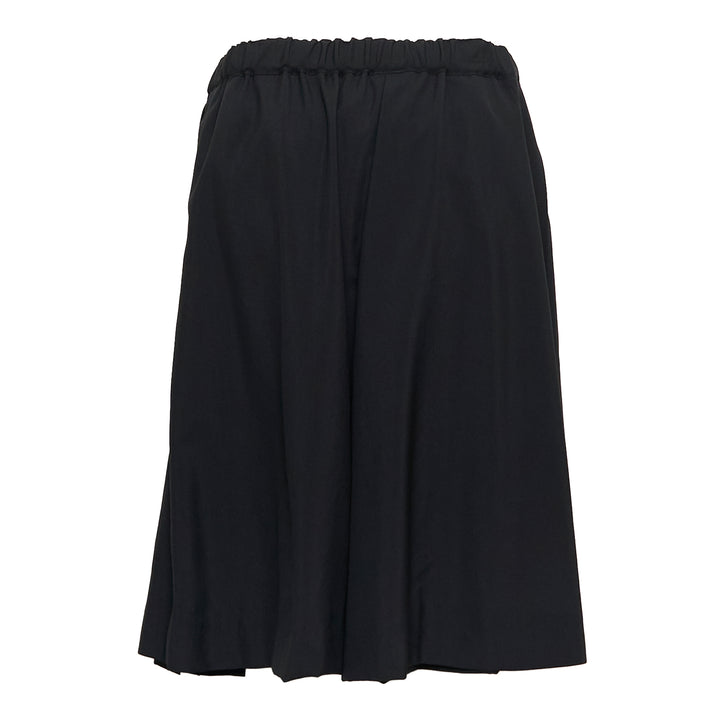 COMME des GARCONS GIRL Wool Tropical Pleated Skirt – Available at Club 21, Official Retailer in Singapore, Malaysia & Thailand with Global Shipping Online