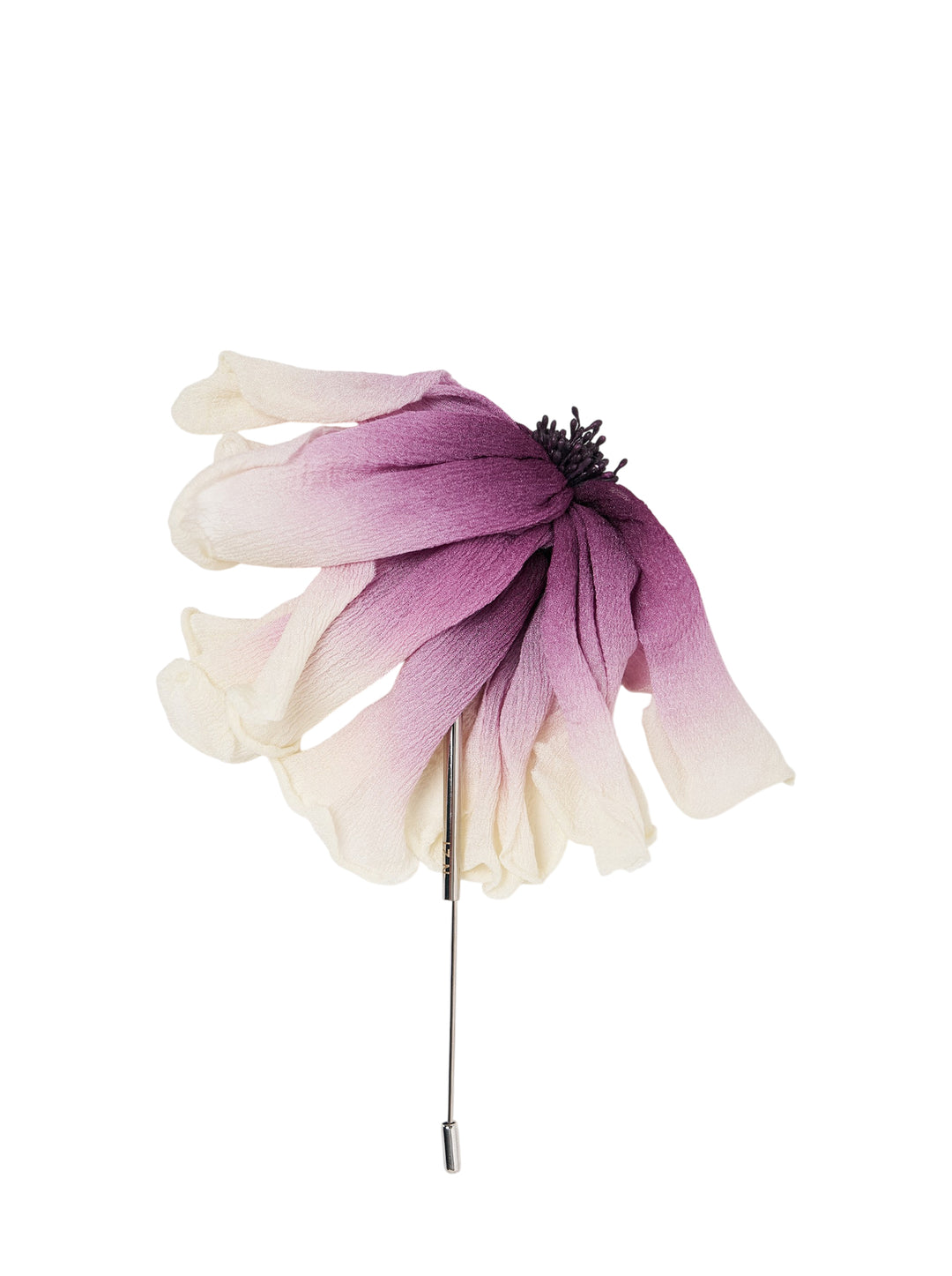 N°21 fabric flower brooch with ivory-to-purple ombré petals and a dark stamen centre, mounted on a polished metal stick pin