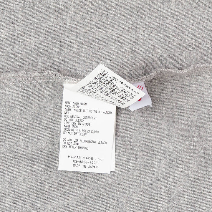 Human Made Baseball Graphic T-Shirt in heather grey, featuring an illustrated group of bear characters in baseball uniforms spelling out Human Made, with the brand wordmark printed below the graphic