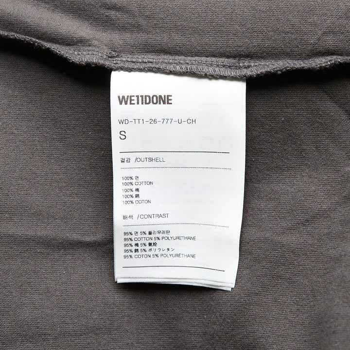 We11done Charcoal Dirty Painting T-Shirt – Available at Club 21, Official Retailer in Singapore, Malaysia & Thailand with Global Shipping Online